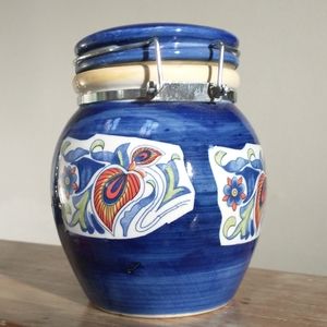 Painted ceramic jar with hinged lid